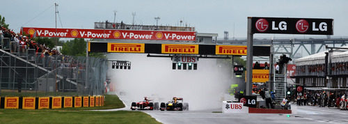 Alonso y Vettel en la salida del GP de Canadá 2011