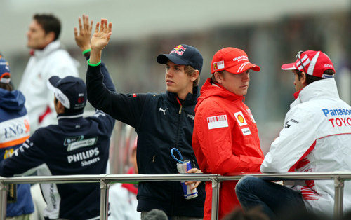 Vettel, Raikkonen y Trulli