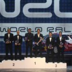 El podio del WRC 2011 en la Gala de la FIA