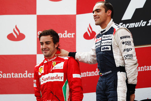 Fernando Alonso y Pastor Maldonado en el podio de España 2012