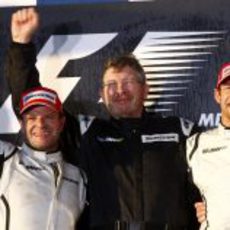 Barrichello, Brawn y Button en el podio