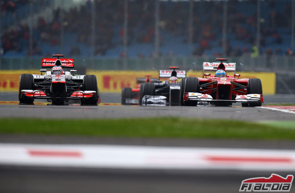 Button y Alonso en la clasificación del GP de Gran Bretaña 2012