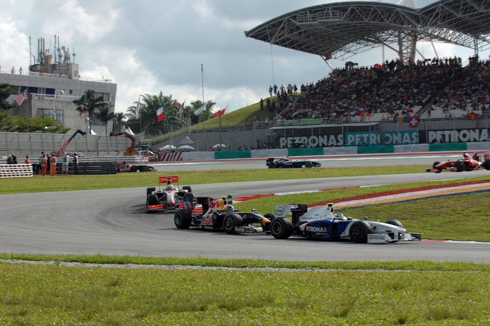 Heidfeld, Vettel y Hamilton