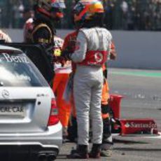 Lewis Hamilton se encara con Romain Grosjean tras el accidente de Spa