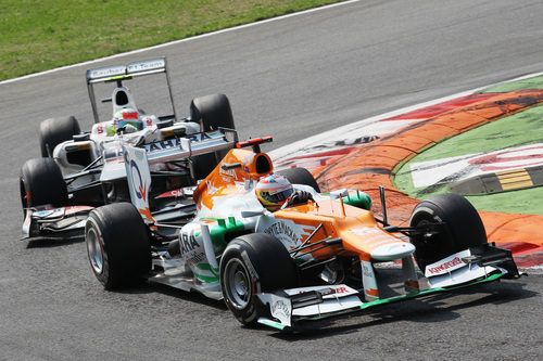 Paul di Resta y Sergio Pérez en Monza