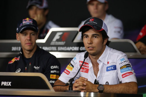Sergio Pérez y Sebastian Vettel en la rueda de prensa