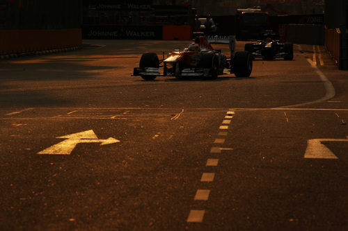 Paul di Resta y Heikki Kovalainen, en penumbra