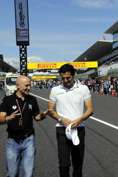 Antonio Lobato y Pedro de la Rosa pasean por la pista de Suzuka