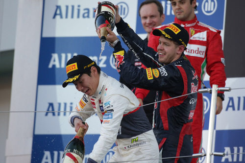 Sebastian Vettel moja a Kamui Kobayashi