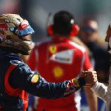 Michael Schumacher felicita a Sebastian Vettel tras su 'pole' en Austin