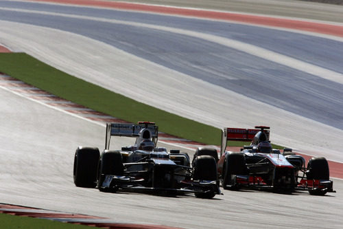 Kamui Kobayashi y Jenson Button en Austin