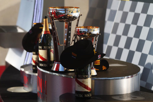Trofeos y champán en el podio del GP de Estados Unidos 2012