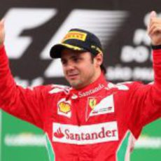 Felipe Massa llora en el podio del GP de Brasil 2012