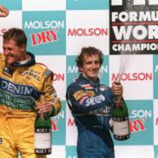 Michael Schumacher y Alain Prost en el podio