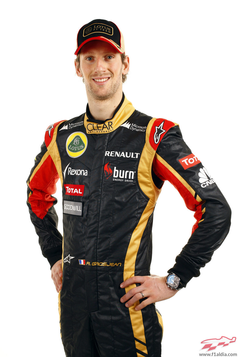 Romain Grosjean posa con la equipación de Lotus para 2013