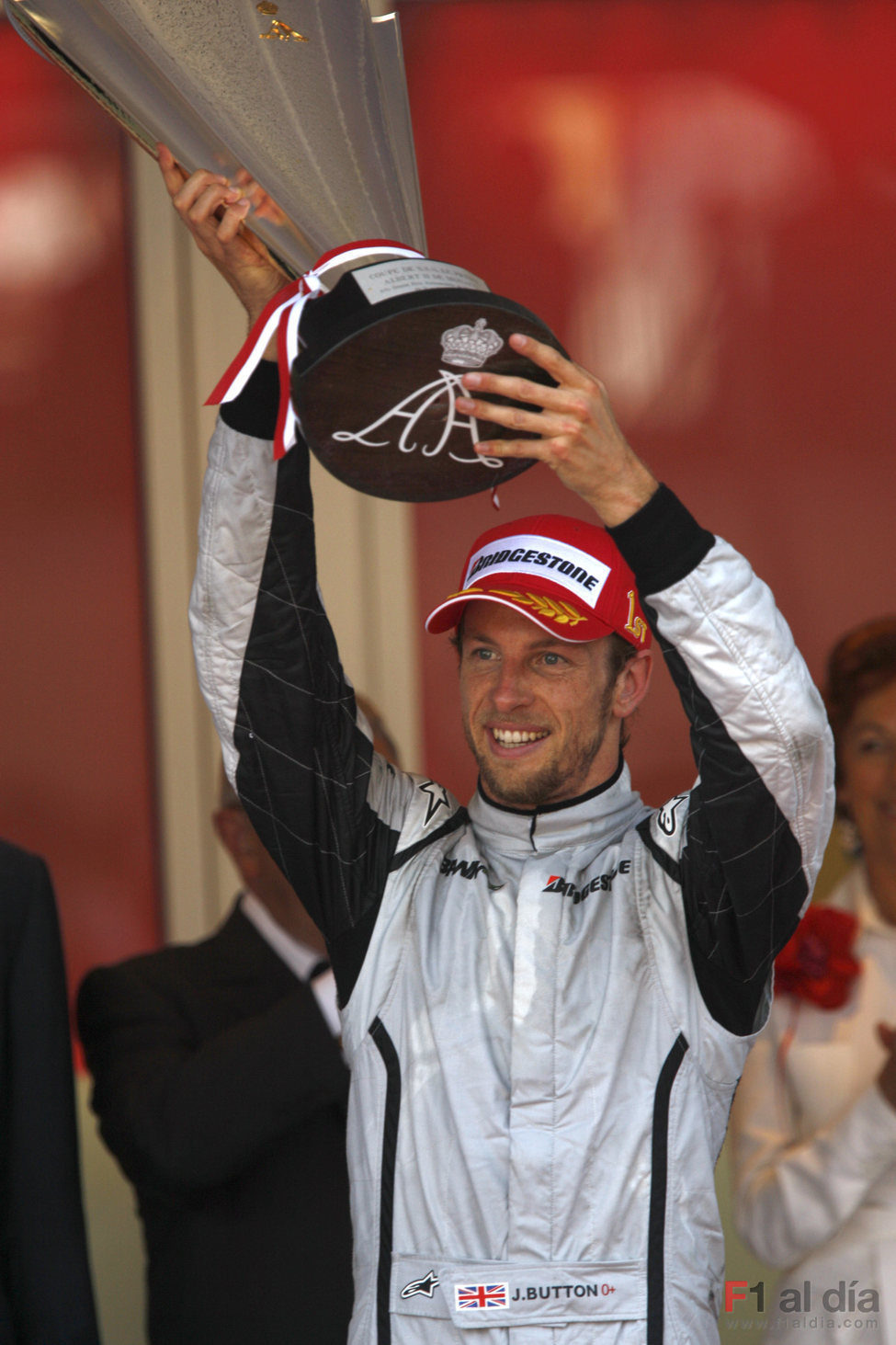 Button con el trofeo de campeón