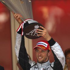 Button con el trofeo de campeón