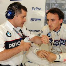 Kubica y un ingeniero