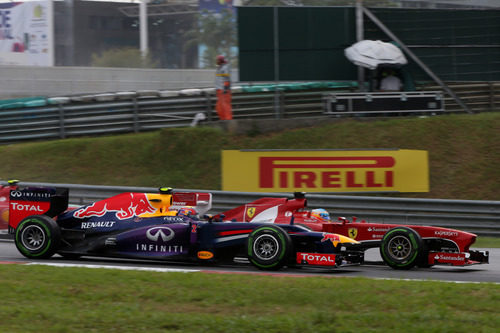 Mark Webber y Fernando Alonso en paralelo