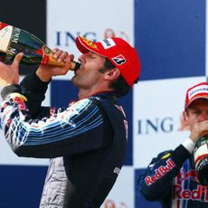 Webber y Vettel con el champán