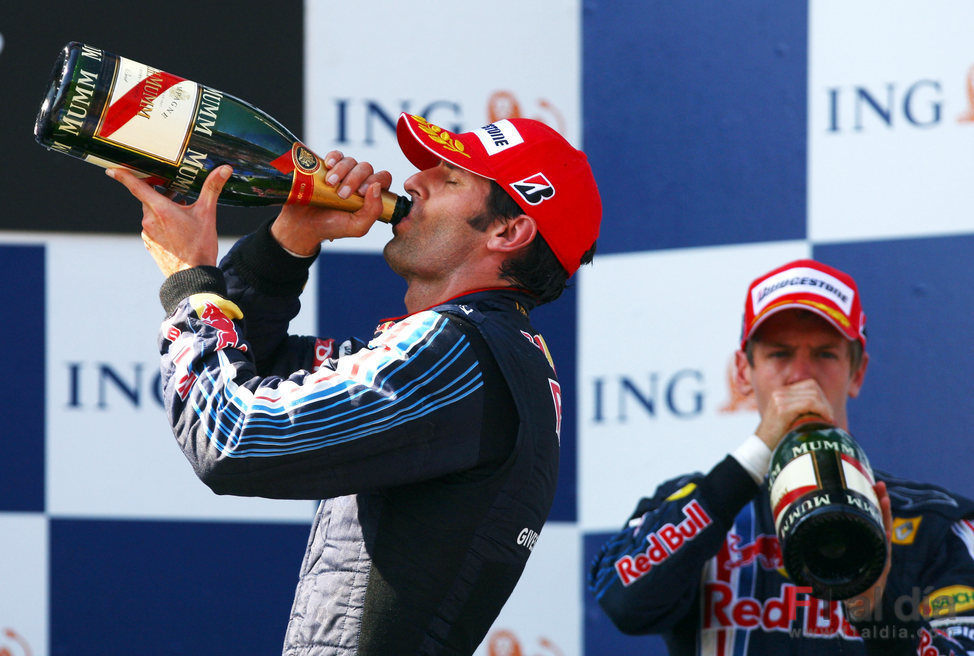 Webber y Vettel con el champán