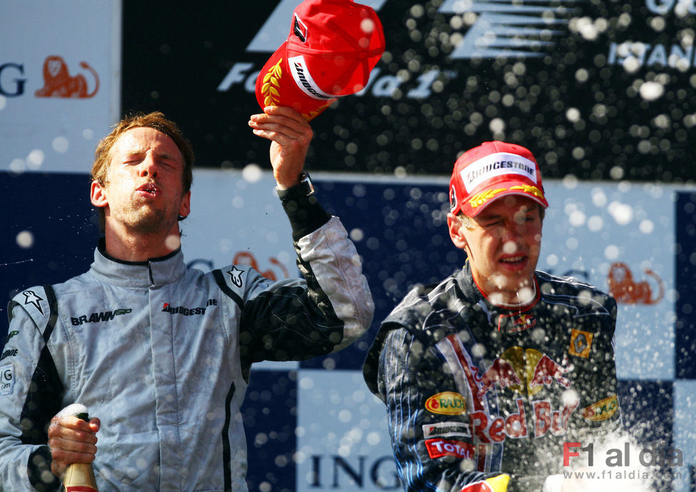 Button y Vettel en el podio