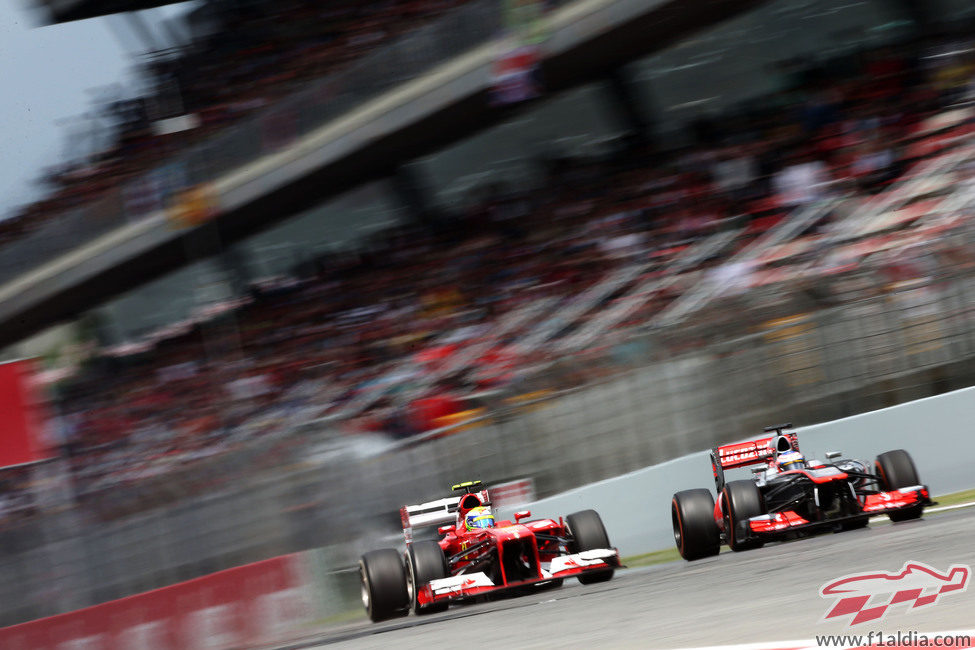 Felipe Massa y Jenson Button frente a frente