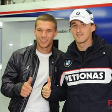 Kubica y Podolski