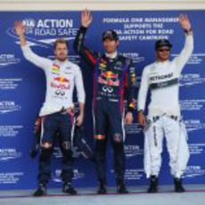 Mark Webber, Sebastian Vettel y Lewis Hamilton tras la clasificación