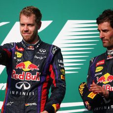 Mark Webber y Sebastian Vettel en el podio de Austin