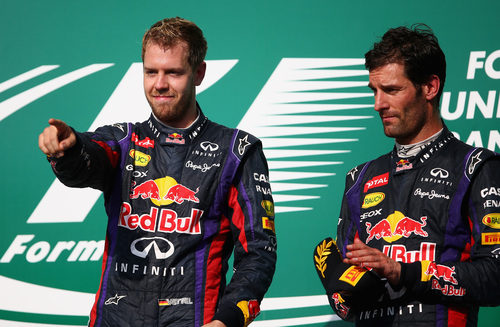 Mark Webber y Sebastian Vettel en el podio de Austin