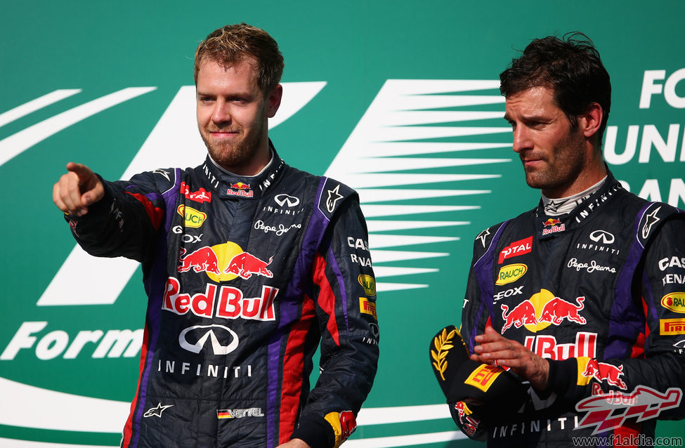 Mark Webber y Sebastian Vettel en el podio de Austin
