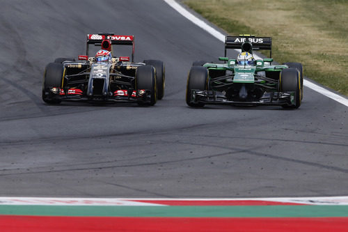 Marcus Ericsson luchando con Romain Grosjean