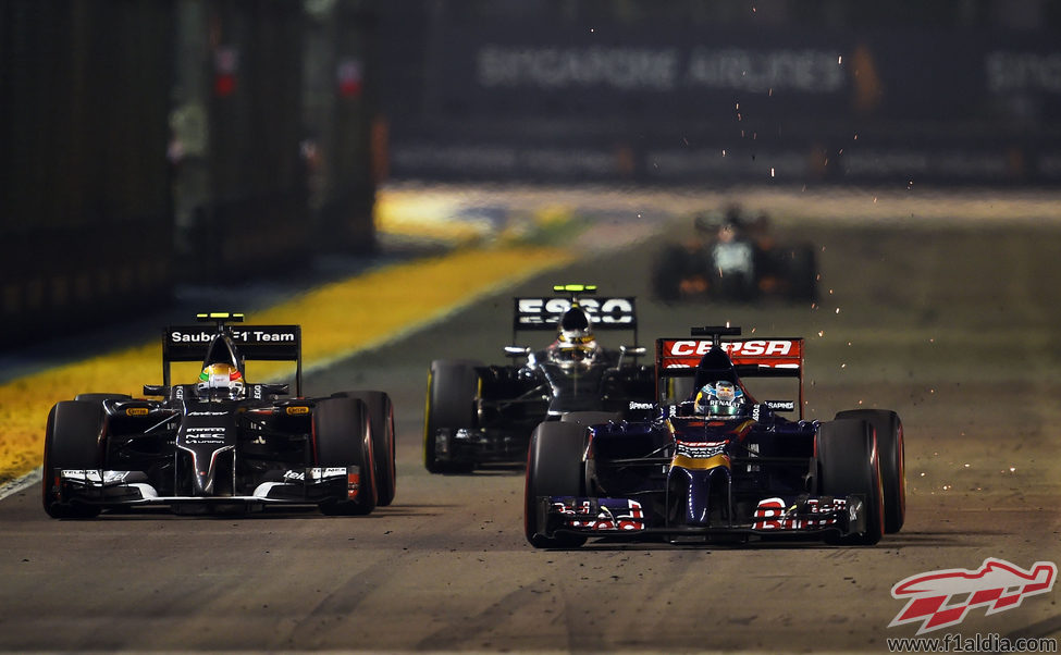 Esteban Gutiérrez luchando con Jean-Eric Vergne