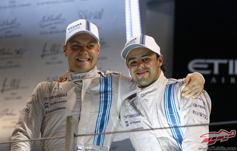 Valtteri Bottas y Felipe Massa en el podio de Abu Dabi