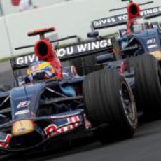 Sebastien Bourdais y Sebastian Vettel