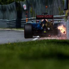 Romain Grosjean tocando el muro