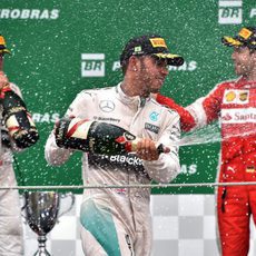 Celebraciones en el podio para Vettel, Rosberg y Hamilton