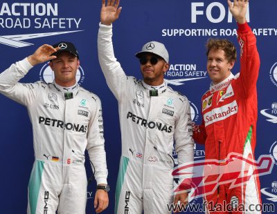 Lewis Hamilton, Nico Rosberg y Sebastian Vettel saludan en Monza