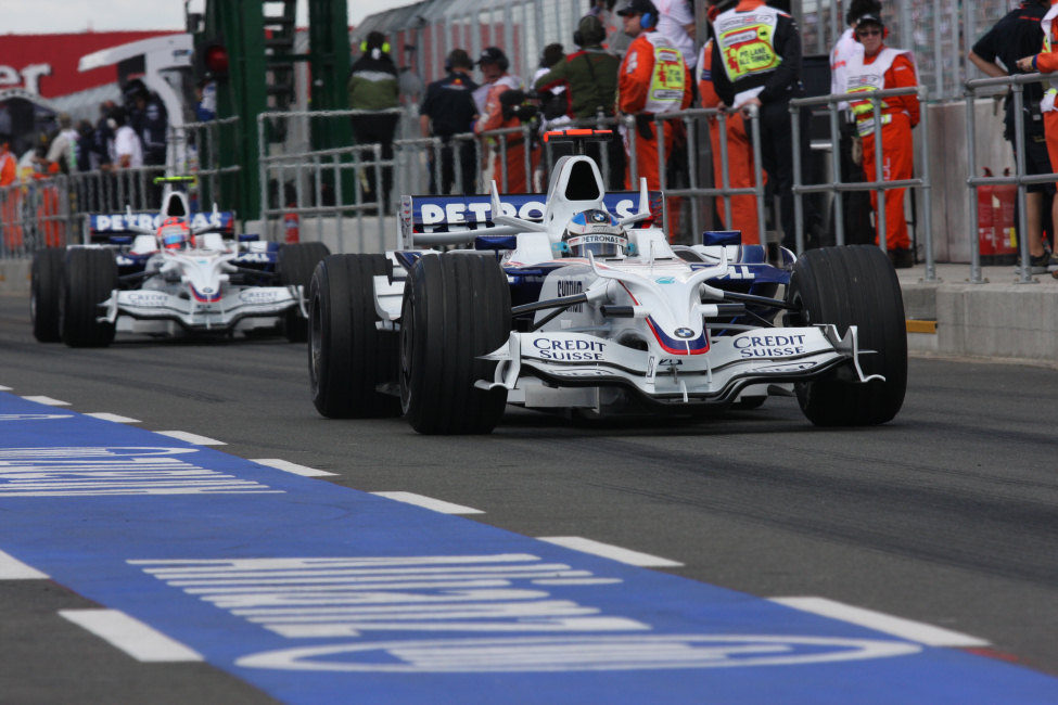 Heidfeld y Kubica en la calle de boxes