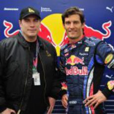 John Travolta y Mark Webber en el GP de Australia 2010