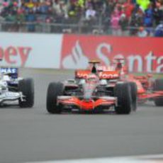 Heidfeld, Kovalainen y Raikkonen