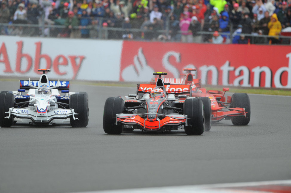 Heidfeld, Kovalainen y Raikkonen