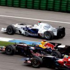 Coulthard entre dos Bourdais y Heidfeld