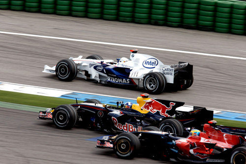 Coulthard entre dos Bourdais y Heidfeld