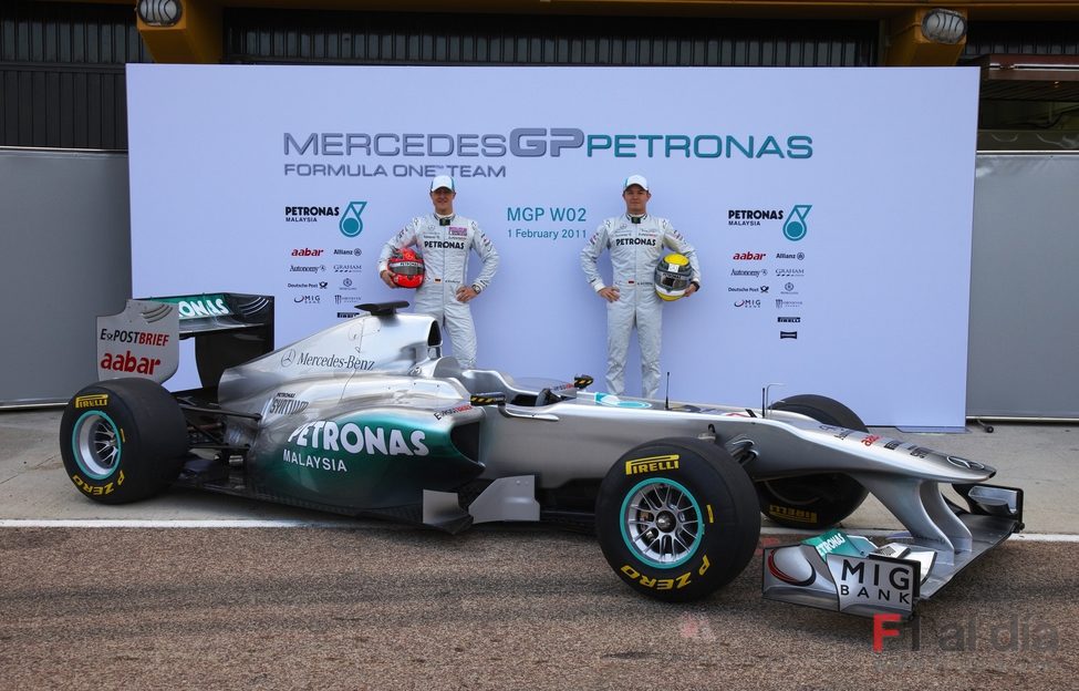 Michael Schumacher, Nico Rosberg y el W02