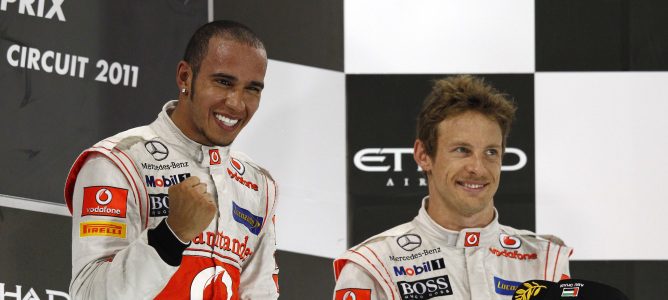 Hamilton y Button en el podio
