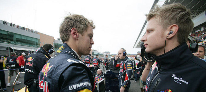 Sebastian Vettel y Tommi Parmakoski