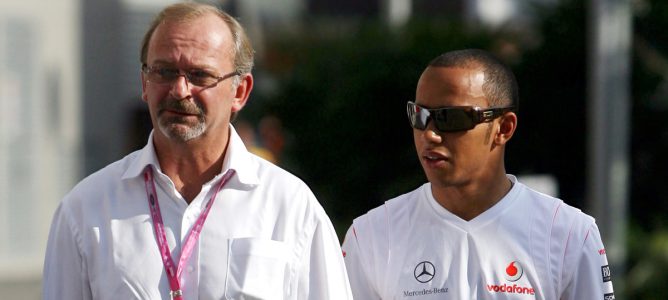 Didier Coton y Lewis Hamilton