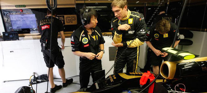 Naoki Tokunaga con Vitaly Petrov